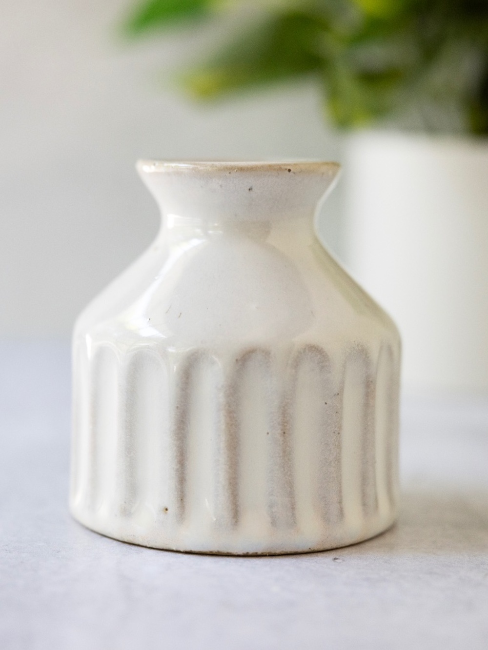 Glazed pottery white tan ribbed bud vase 3.5 inches tall